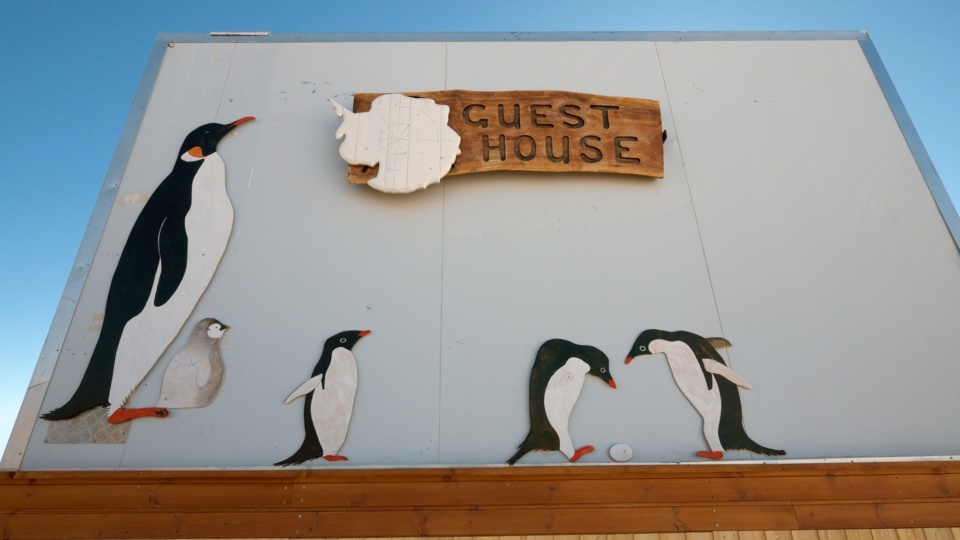 Oasis Guesthouse Antarctica Sign